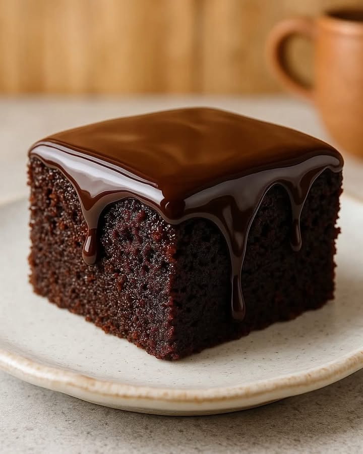 Indulge in Rich Belgian Chocolate Cake with Ganache 2 melting belgian ganache Elite Cooking Recipes